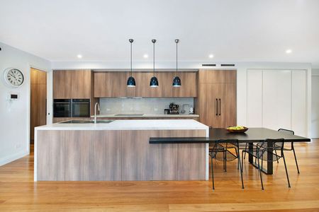 Spacious & Modern Family Home in Prime Roselands Location - Photo 2