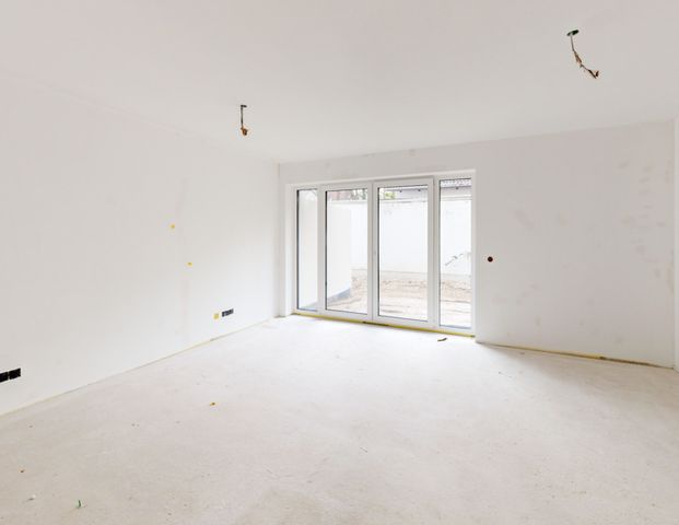 Exklusive 2-Zimmer-Neubauwohnung mit Terrasse und Garten in Niedrigenergiebauweise (A+) - Photo 1