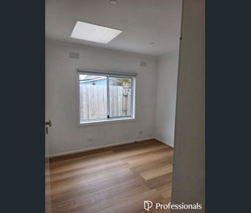 Stylish 3-Bedroom Unit with Solar Panels - Photo 1