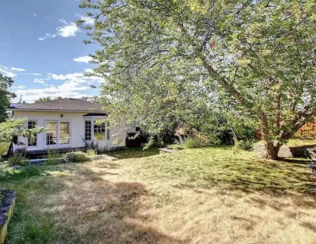 2B+1 Den Bungalow - Top House | 2314 Richmond Road Southwest, Calgary - Photo 1