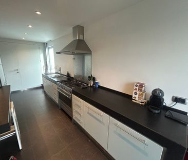 Ruim duplexappartement (140 m²) met 2 slpkrs en ruim terras in Paal - Photo 4