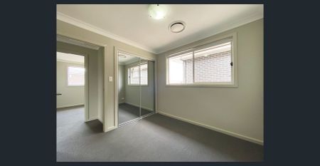 Modern Family Home in Prime Convenience | Walk to Schools, Station & Park - Photo 2