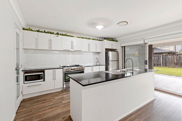 36 Diamond Hill Circuit, Edmondson Park NSW 2174 - House For Rent | Domain - Photo 1