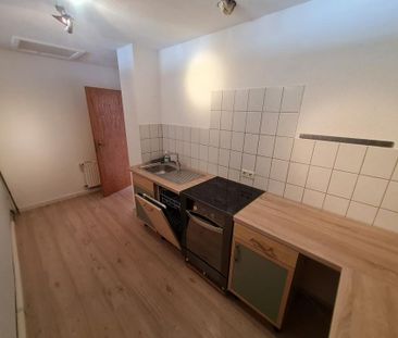 großzügige DG-Wohnung mit Stellplatz oder Garage - Foto 1
