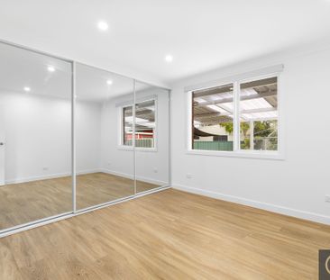 Fully Renovated 3 Bedroom Brick Home - Photo 4