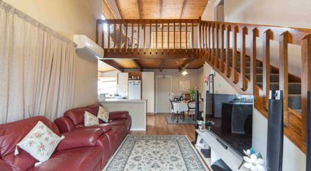 Three Bedroom Oasis - Photo 2