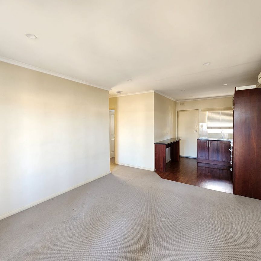 Two Bedroom Upstairs Unit with private courtyard provision - Photo 1