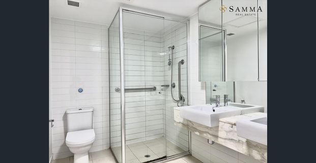 Elevated Living with Double Balconies & Stunning Harbour Views in Docklands - Photo 1