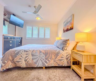 Stylishly Renovated Townhouse in Sought-After Gated Estate - Photo 4