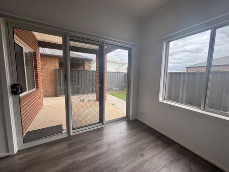 Modern Comforts Await in This 4-Bedroom, 2-Bathroom Home - Photo 5