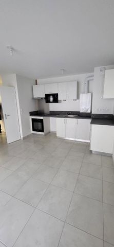 Location Appartement 2 pièces 43m² DECINES CHARPIEU 69150 - Photo 2