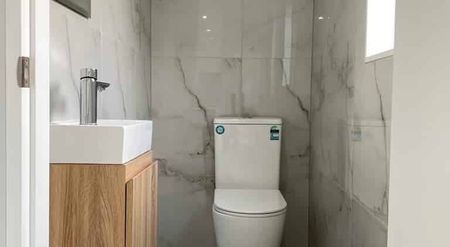 Elegant Four-Bedroom Home in a Convenient Location - Photo 3