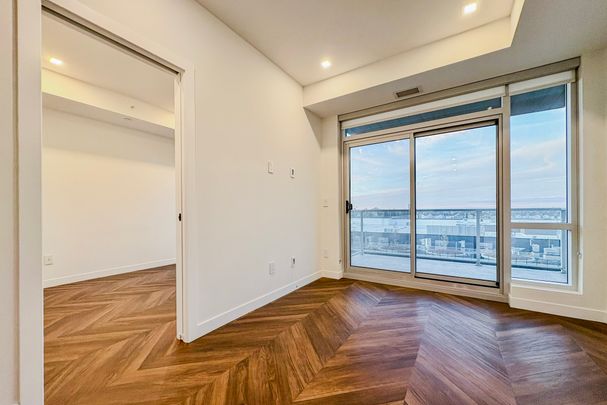 Stylish West Springs Living At Gateway West | Underground Parking | Heat And Water Included - Photo 1