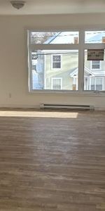 5 1/2 a louer, construction 2025, jamais habité, triplex tranquille proche du centre ville. - Photo 3