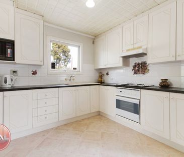 Spacious Family Home in a Convenient Ingle Farm Location - Photo 6