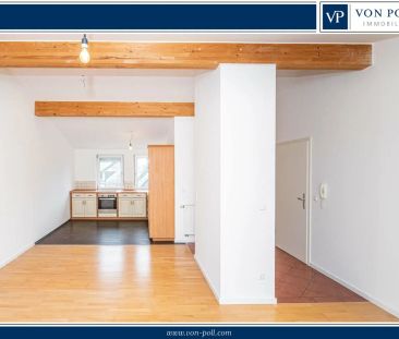 Vermietung: Helle Dachgeschosswohnung mit Balkon und Wohlfühlambiente - Photo 2