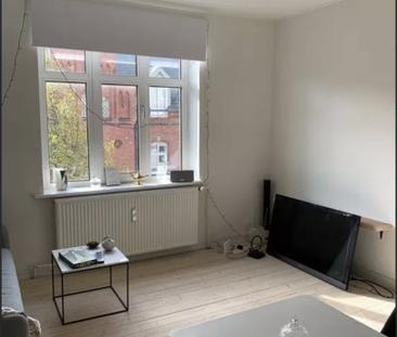 Velholdt lejlighed i flot murstensejendom i hjertet af Randers - Foto 3 | Rentumo