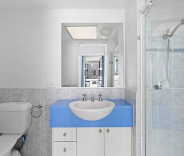 Coastal Living with a Private Rooftop Retreat - Photo 6