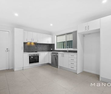 Contemporary Low-Maintenance Living in a Convenient Location - Photo 2