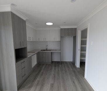 Brand New 2-Bedroom Home with Spacious Yard - Photo 1