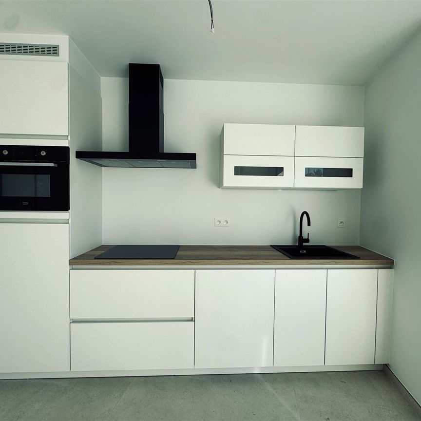 Gelijkvloers appartement met gezellige tuin - Photo 1