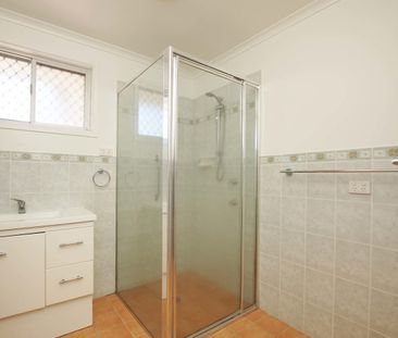 Comfortable Three-Bedroom Home with Practical Living! - Photo 6