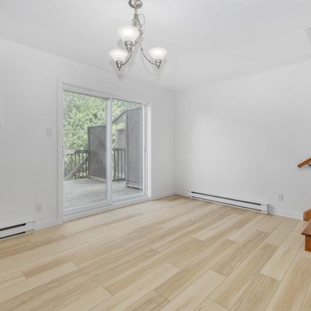 Disponible 1er juillet 2026 Maison entièrement rénovée en 2026 : 3 chambres avec balcon et accès à la cour arrière Sainte-Adèle - Photo 3