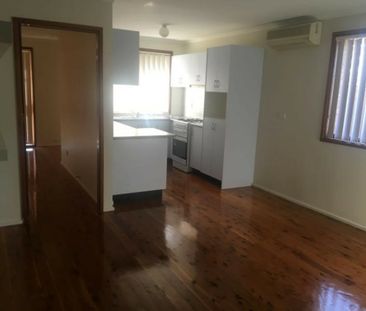 Charming 3-Bedroom Home with a Spacious Backyard! - Photo 4