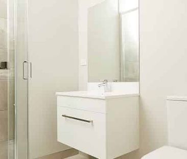 Modern One-Bedroom Townhouse in Prime Location - Photo 2