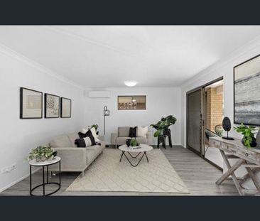 Stylish Family Home in a Prime Location! - Photo 1