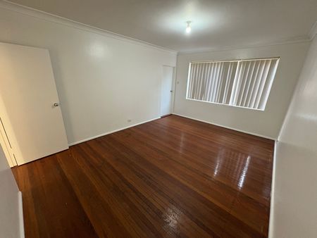 Freshly Painted 2-Bedroom Unit in Convenient Location - Photo 5