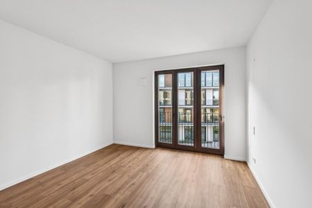Preisgedämpft: 3-Zimmer-Wohnung mit 2 Terrassen im exklusiven Neubauquartier Deiker Höfe in Stockum! - Photo 2