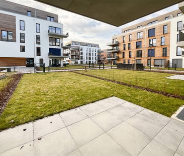 Wohlfühloase: Moderne 1,5-Zimmer-Wohnung mit Terrasse und Garten in... - Photo 1