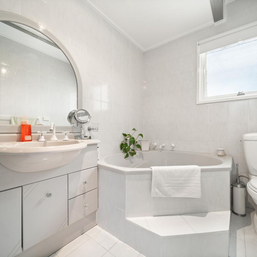 Family Living with beautifully landscaped gardens in a great location - Photo 1