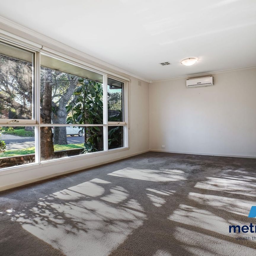 SPACIOUS UNIT IN SOUGHT AFTER LOCATION - Photo 1