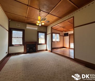 Comfortable & Convenient Living in the Heart of Sunshine - Photo 2