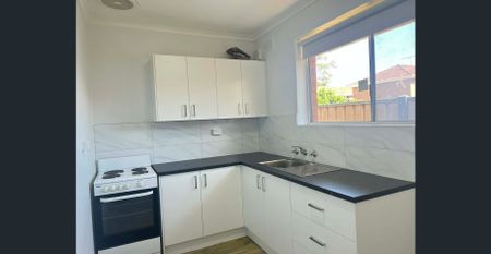 COMFORTABLE UNIT IN PRIME SUNSHINE LOCATION - Photo 4