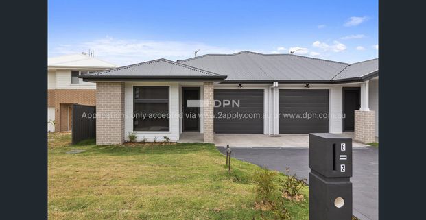 Brand New Spacious Duplex! - Photo 1