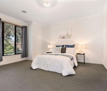 Spacious 4-Bedroom Home with Abundant Natural Light - Photo 2