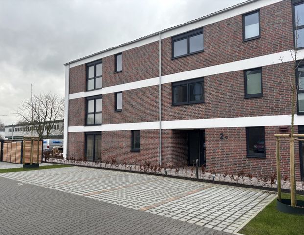 Wohnen am Norder Tief: Schöne Erdgeschosswohnung mit Blick auf die Mühle - Foto 1