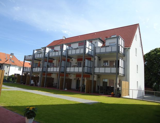 Gepflegte Erdgeschosswohnung mit Terrasse und Tiefgaragenstellplatz - Foto 1