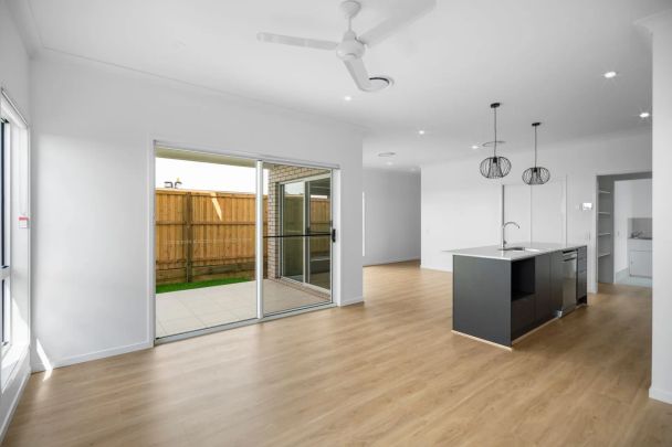 Brand New Family Home in Oxley's Premier New Estate - Photo 1