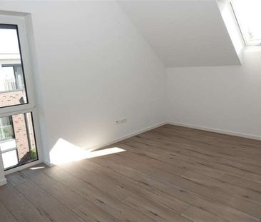 Neubauwohnung mit sonniger Dachterrasse in guter Lage von Schortens! - Foto 3