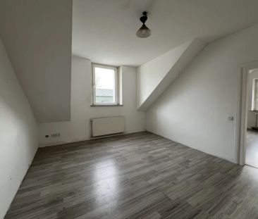 Charmante Dachgeschosswohnung direkt in der Gevelsberger City - Foto 1