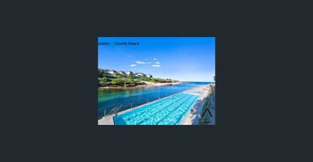 Executive Top-Floor Apartment with Ocean/District Views - Photo 5