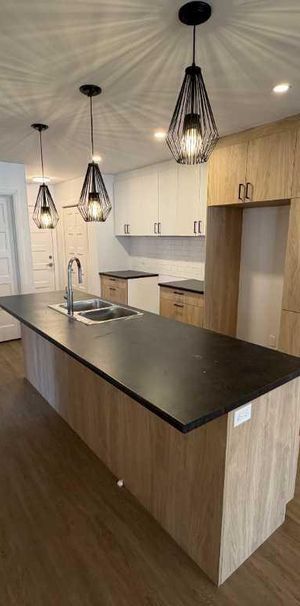 Superbe 5 ½ moderne à Venise-en-Québec – Îlot central – Disponible maintenant - Photo 1