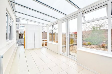 A 2 bedroom detached bungalow with a garage and driveway parking in Lowton. - Photo 2