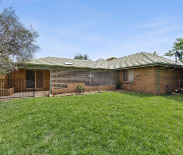 Refreshed Four-Bedroom Home With Gated Side Access - Photo 3