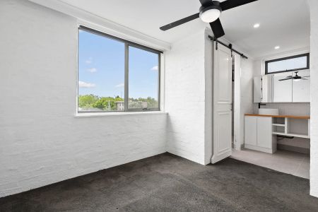 Light-Filled Top-Floor Sanctuary with Sweeping Views and Exceptional Space - Photo 3