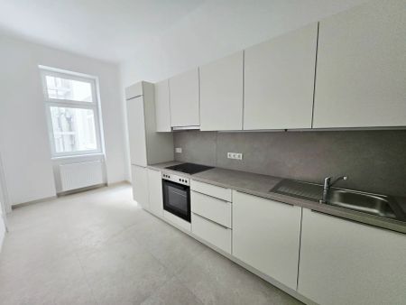 Erstbezug nach Sanierung – Stilvolle 2-Zimmer-Wohnung im 5. Bezirk - Bräuhausgasse - Photo 2
